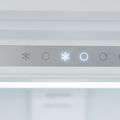 A refrigerator’s touch control strip with one snowflake icon lit
