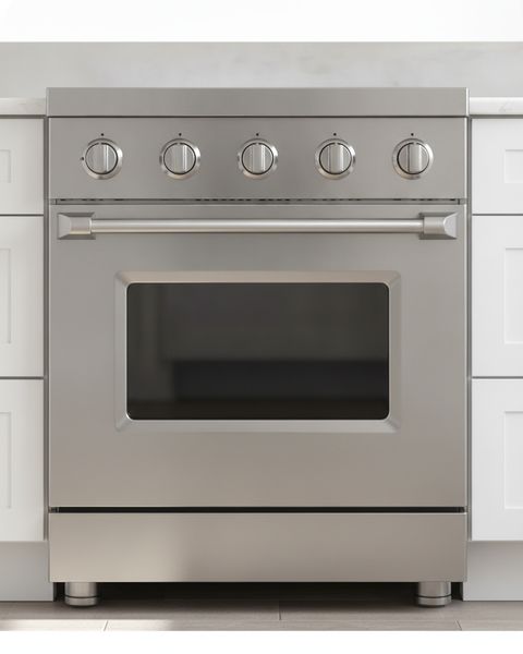 The front of a stainless steel pro-style range with heavy knobs and a wide oven door
