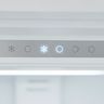 A touch control strip inside a refrigerator with one icon lit